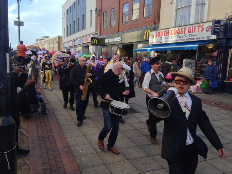 Dr Savage leads a cast of hundreds through the middle of Hastings