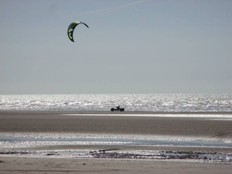 Kite flying at Camber Sands - but with a station close by