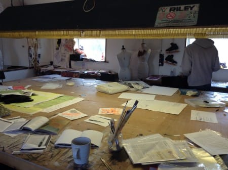 The billiard tables are now work tables