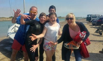 Happy family after their sail