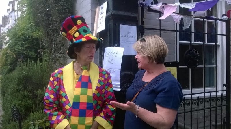 Enticing the the passing locals and visitors to enter and spend money, funds for Acting UP - Rye theatre group