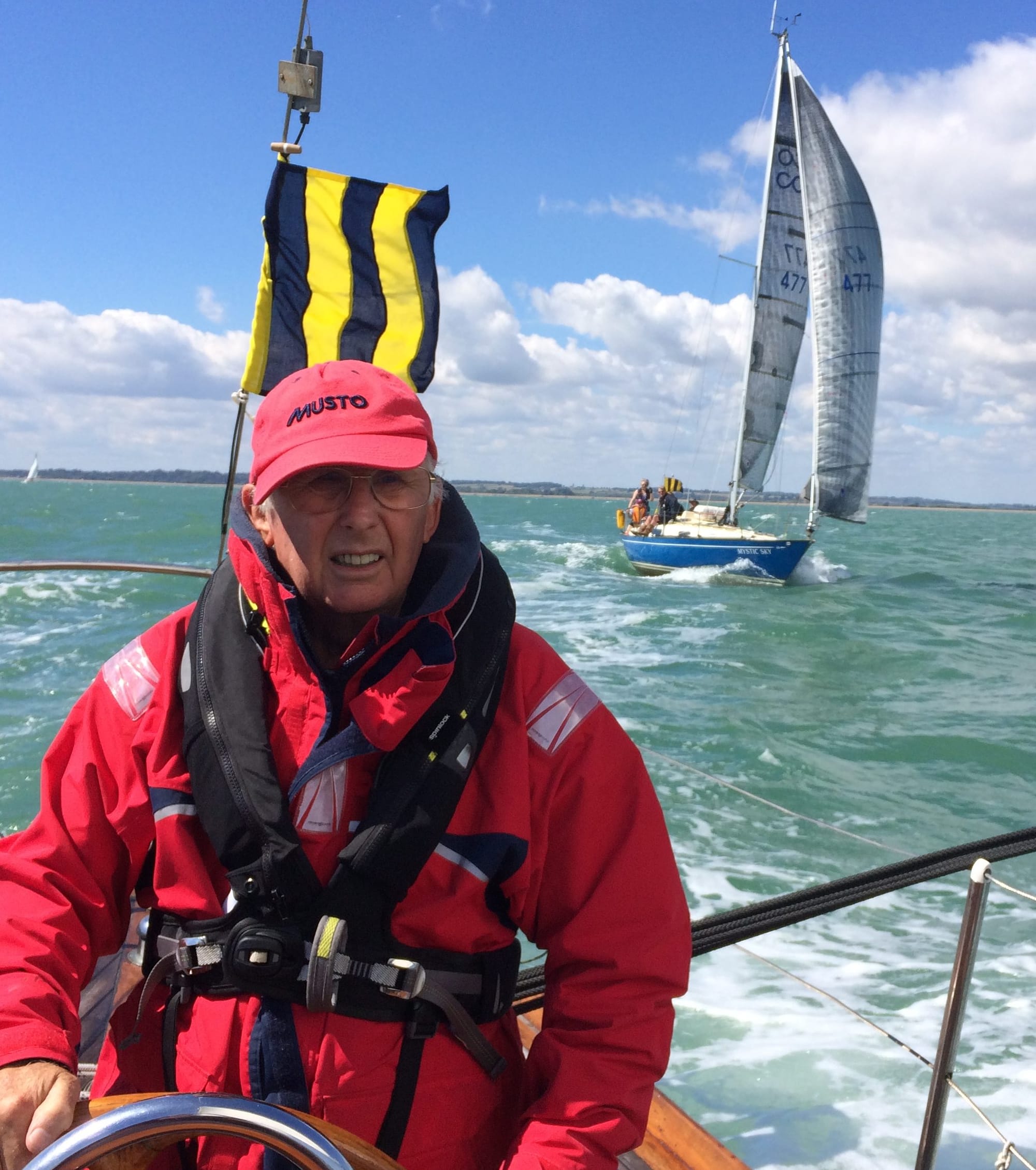 Mystic Sky creeps up astern on Helena Ann with skipper Hugh Redman at the wheel