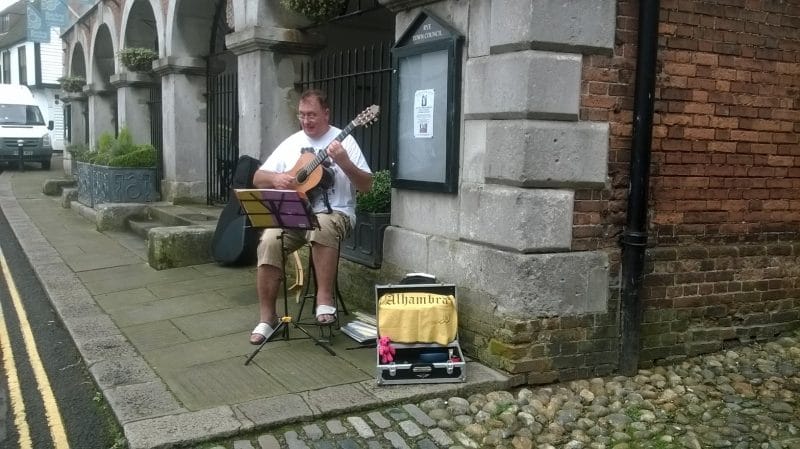 Classical music wafting around the corner, John Keene