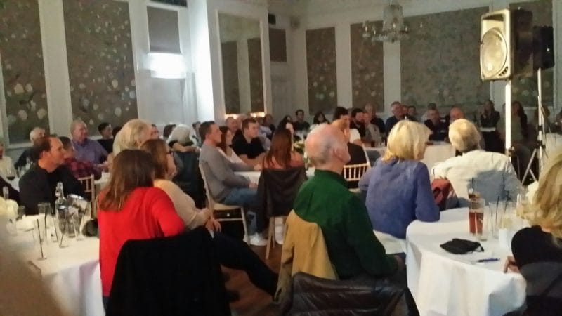 The room was packed and everyone was very attentive