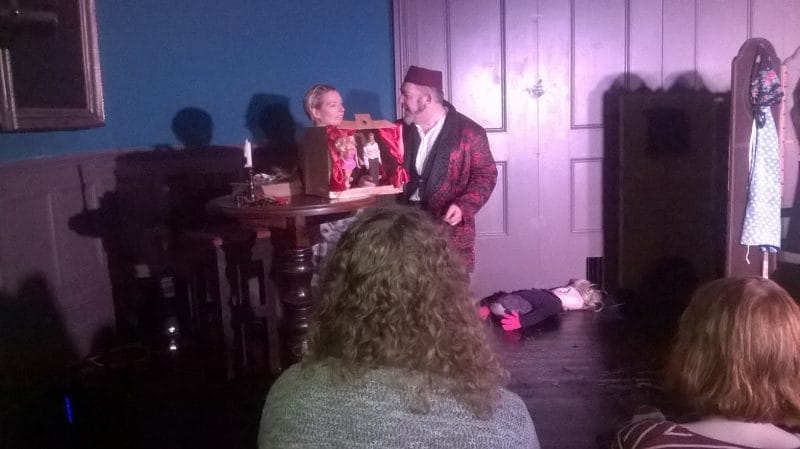 Kate and John, having fun with a mini theatre